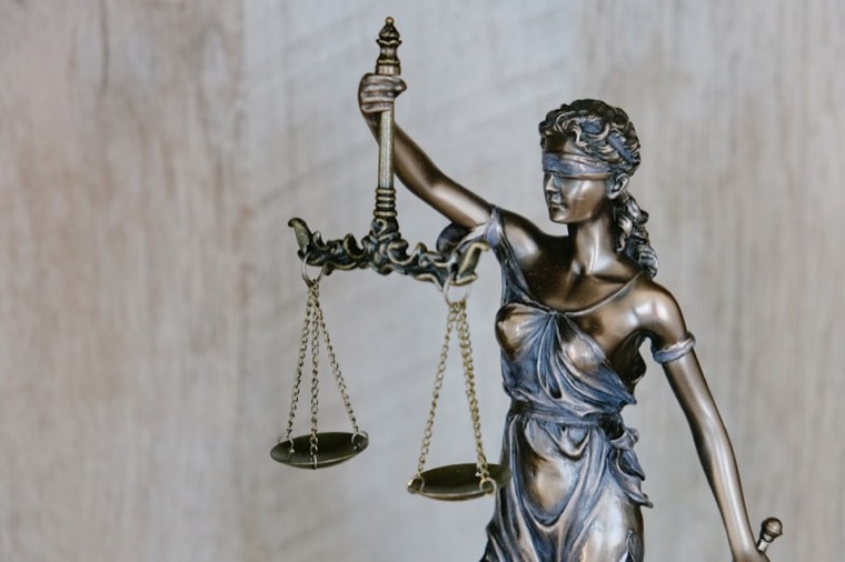 Scales of justice representing lawful debt resolution