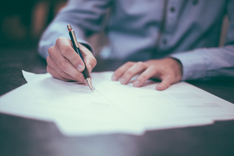 Advisor reviewing loan documents and statements during a debt-resolution case assessment